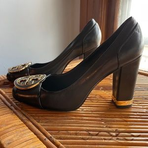 Tory Burch black heels with gold emblem